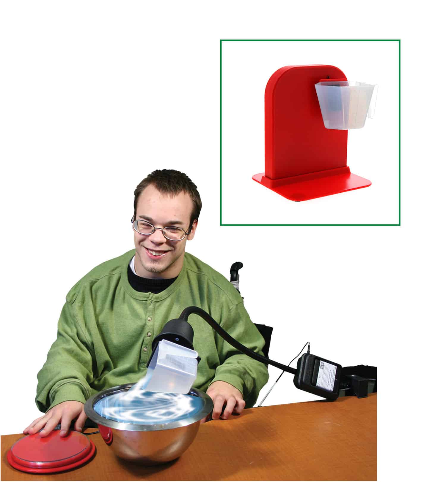 Person using a communication device with a close-up of a red and white device on a white background. Special Needs Computers.