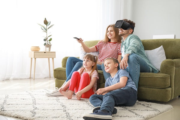 Acesight VR – Electronic eyeware watching TV with family