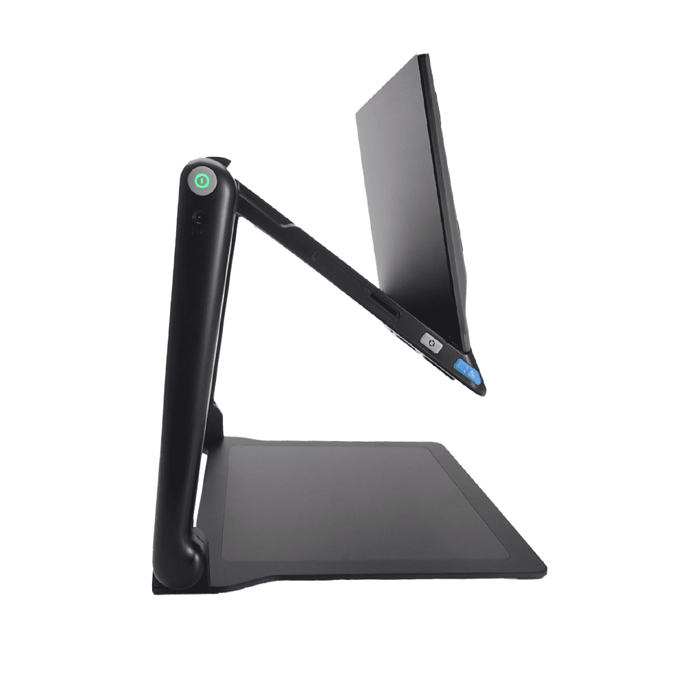 A black tablet shown at an angle with its screen tilted upward, resting on a matching black stand against a plain white background. Special Needs Computers.