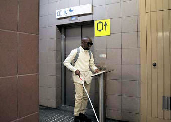 Tactile Floor Domes man at elevator