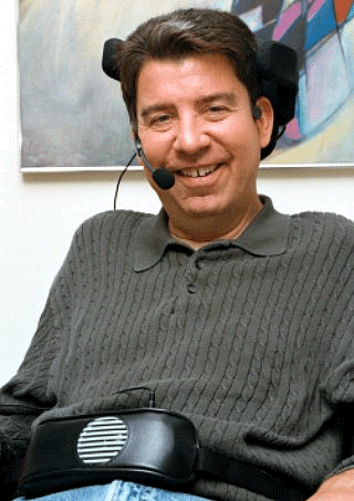 Man leaning back in chair wearing a chattervox